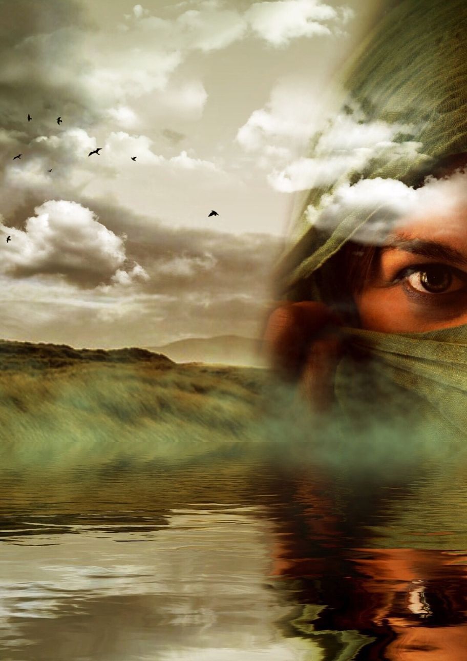 image : une femme regarde un lac